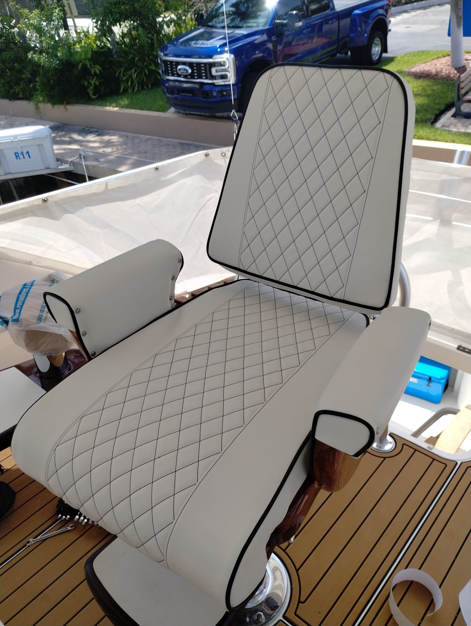 Image depicting a new custom upholstered Captain's Chair.