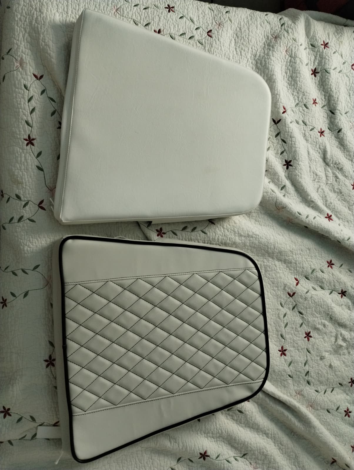 Image depicting a comparison of the new custom upholstered Captain's Chair vs the old one.