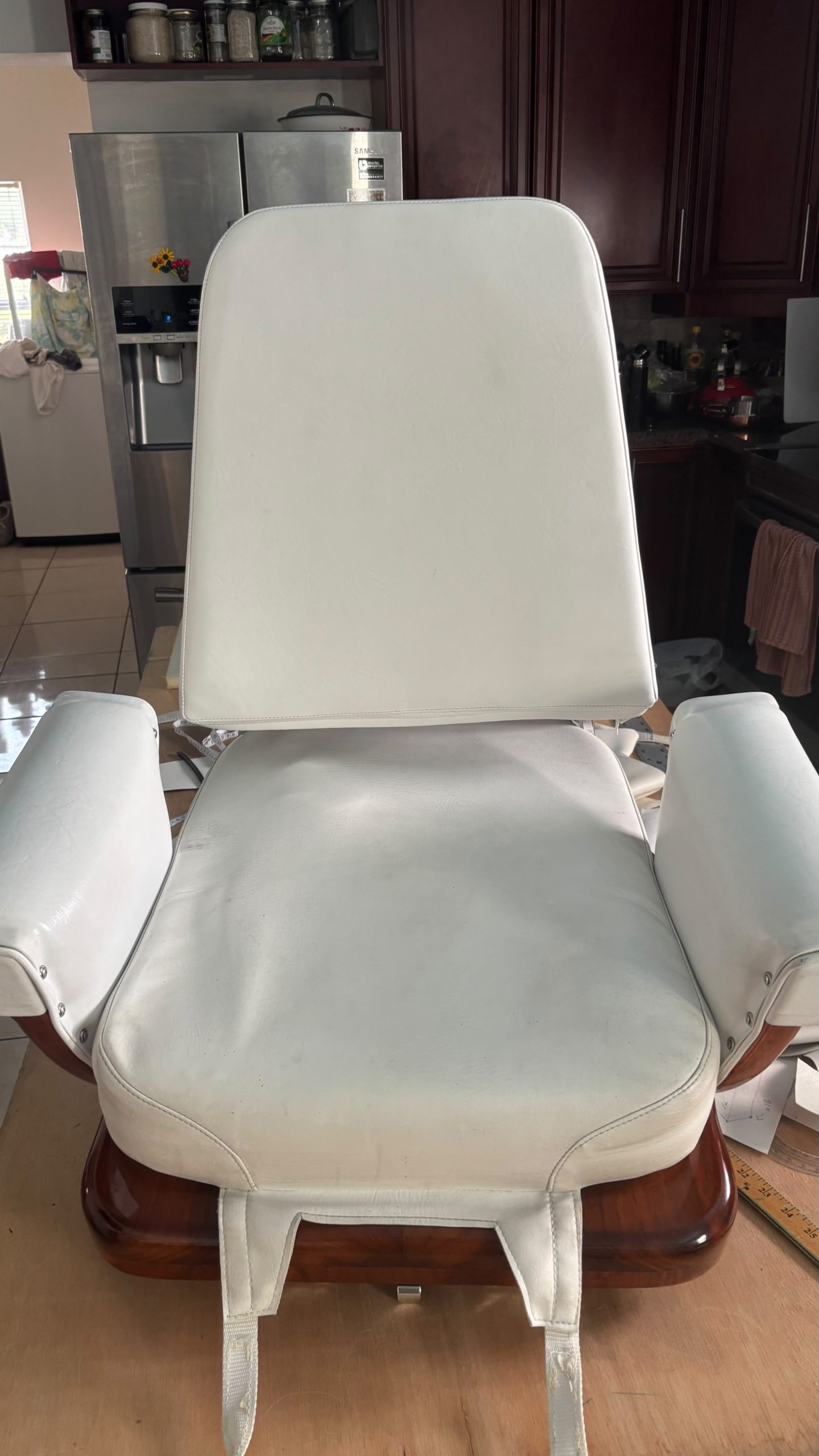 Image depicting an old Captain's Chair.