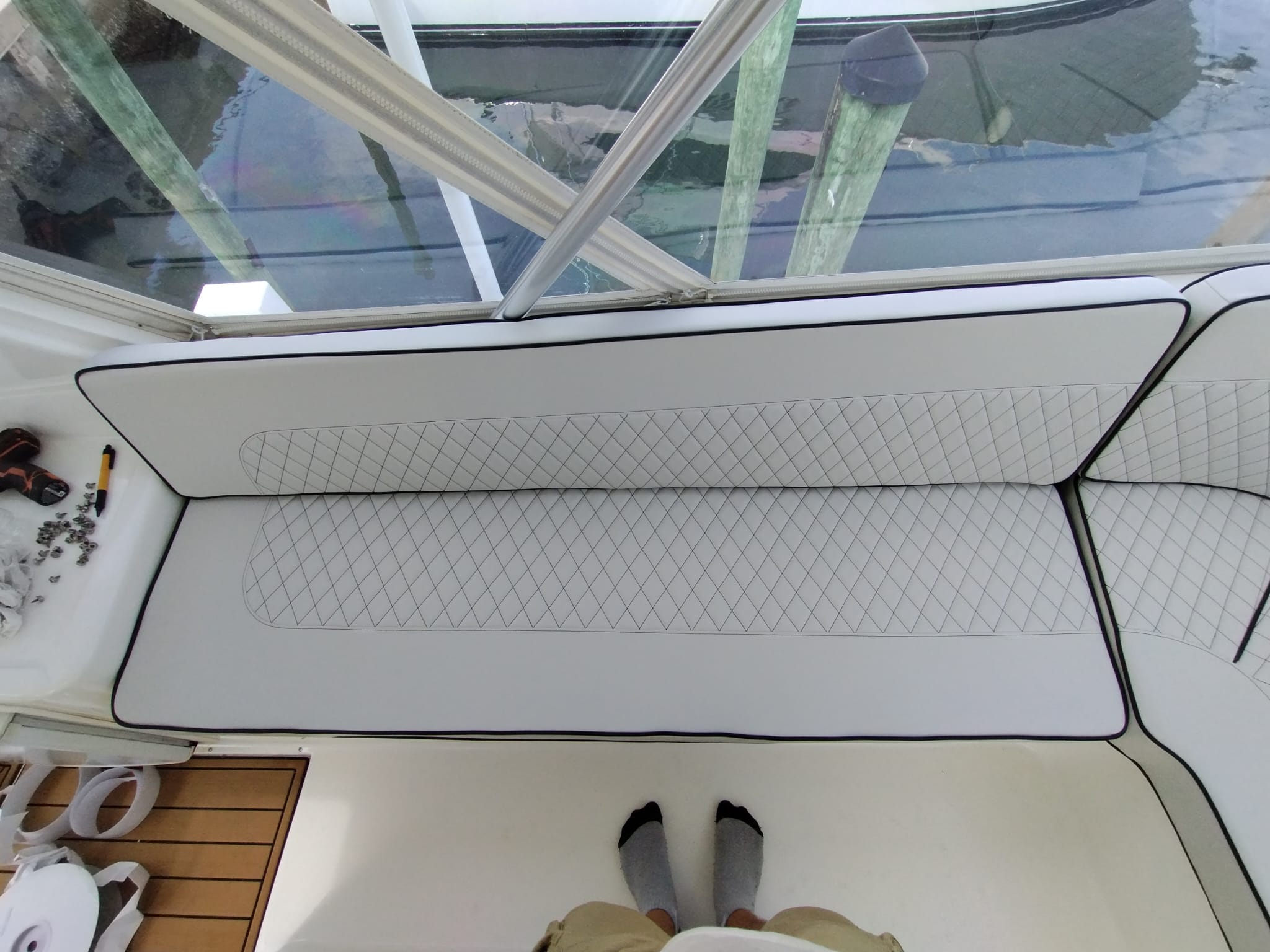 Image depicting custom upholstered yacht cushions installed on their yacht.
