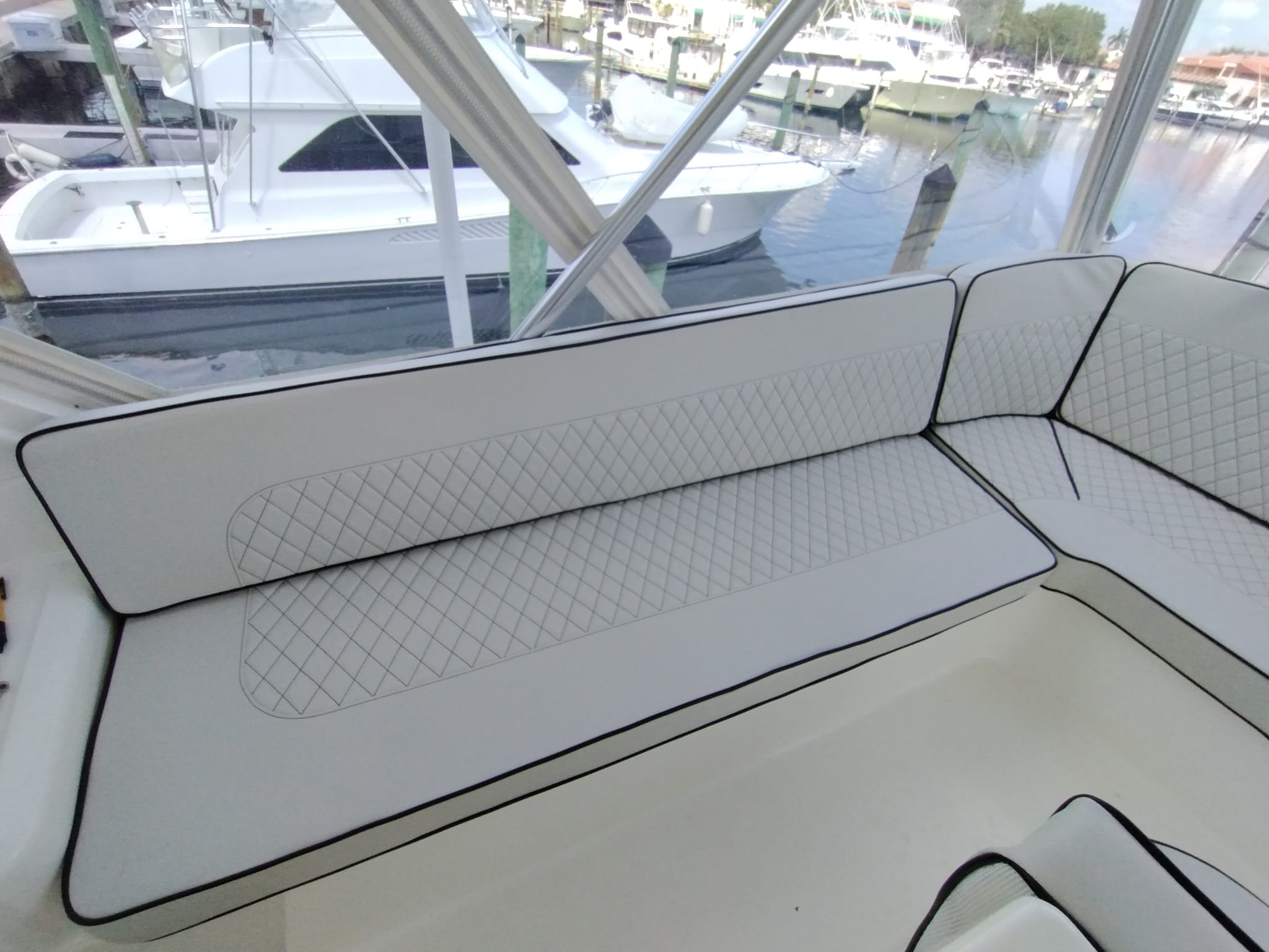 Image depicting custom upholstered yacht cushions installed on their yacht.