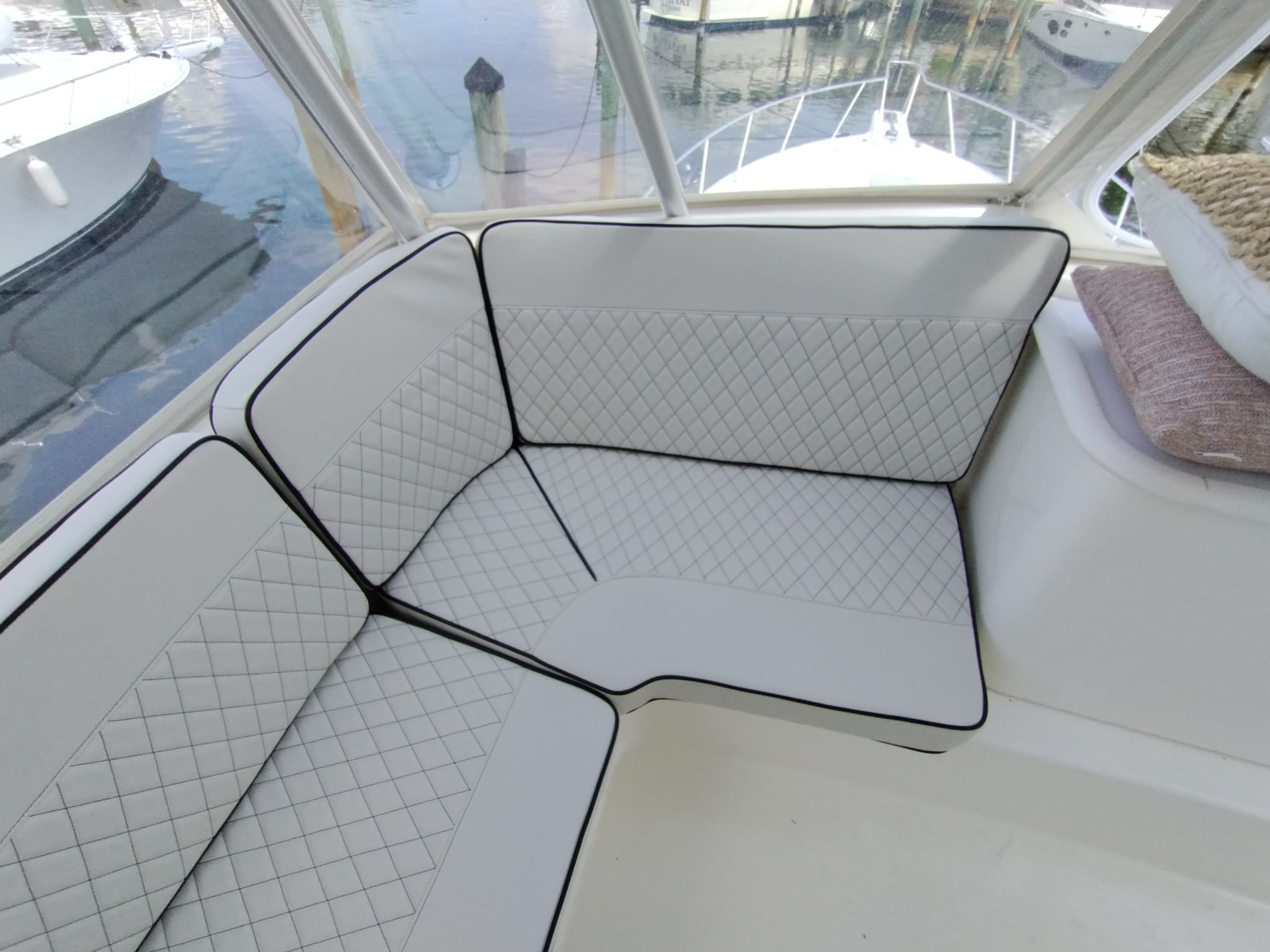 Image depicting custom upholstered yacht cushions installed on their yacht.