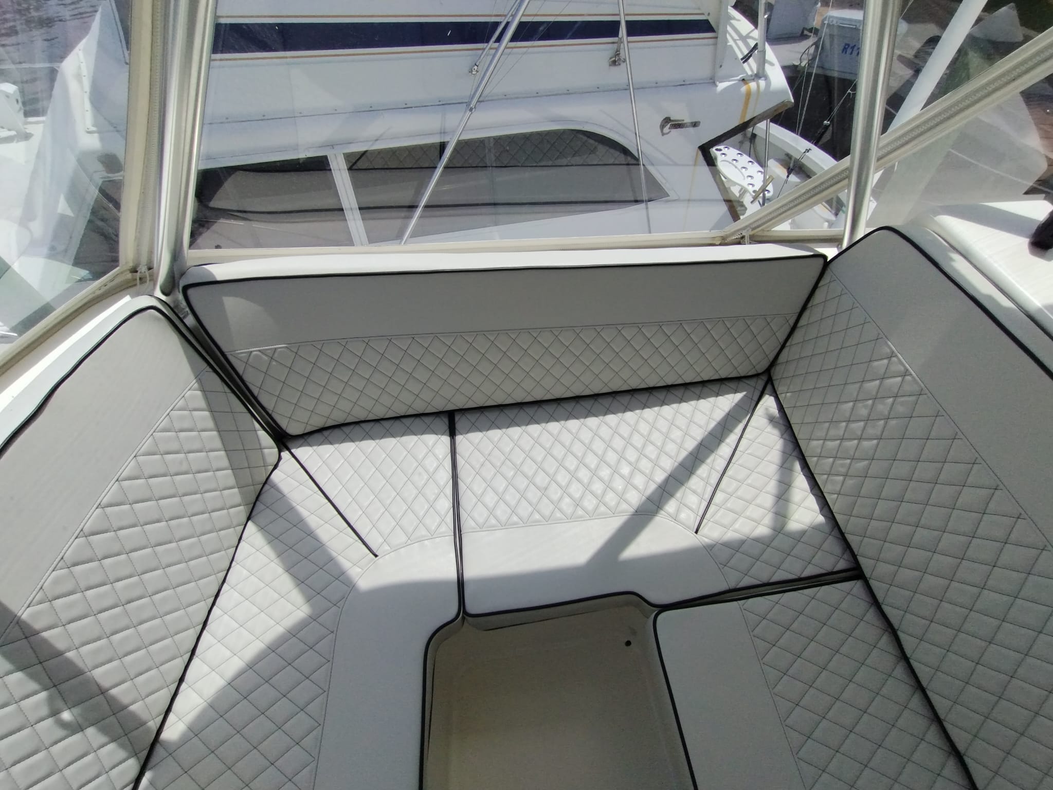 Image depicting custom upholstered yacht cushions installed on their yacht.