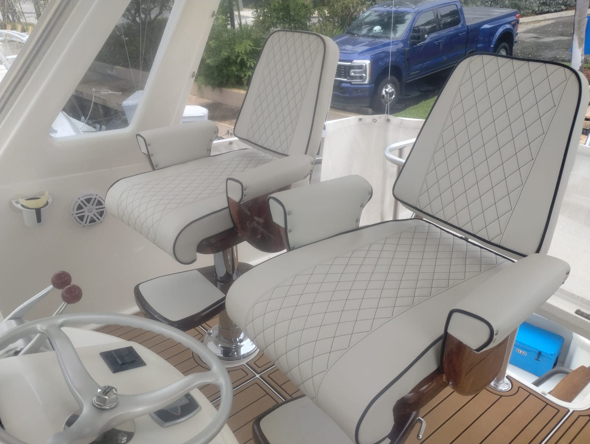 Two new captain's chairs with new upholstery.