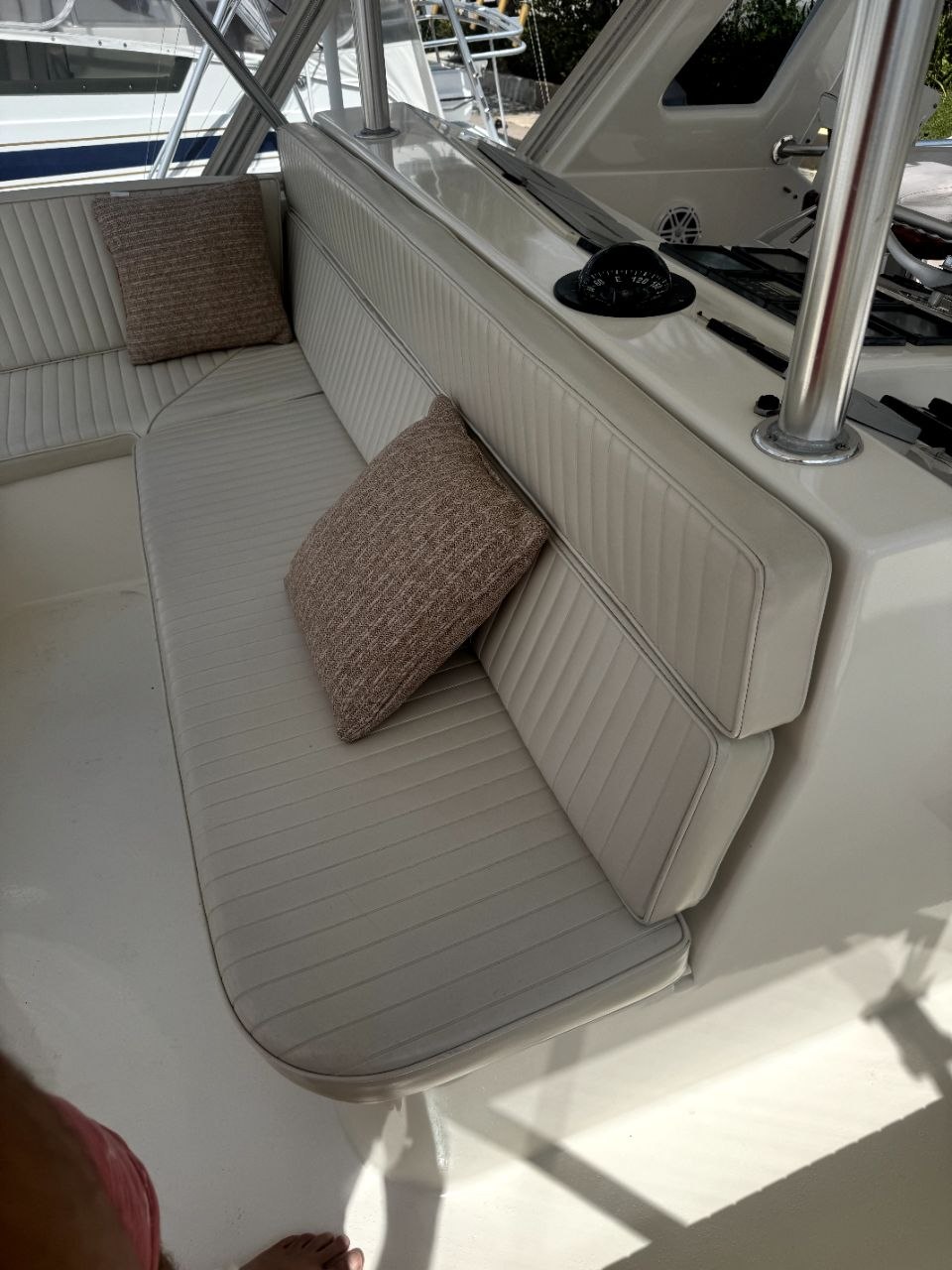 Worn side boat cushions before reupholstery