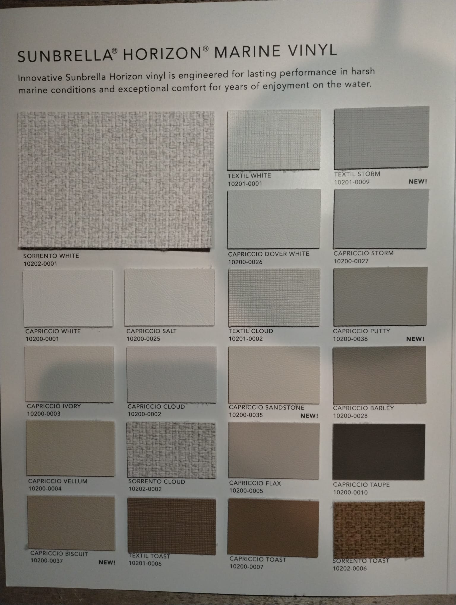 Sunbrella Horizon marine vinyl swatch book page showing light and neutral vinyl color samples