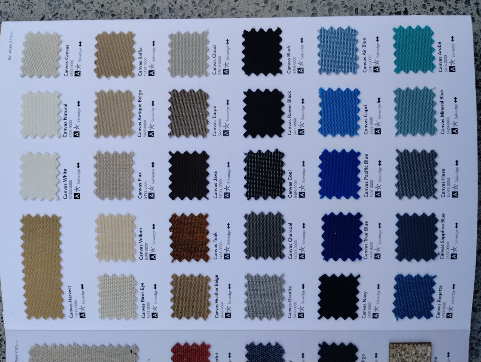 Sunbrella Canvas fabric swatch book page showing marine canvas colors for boat covers and shades